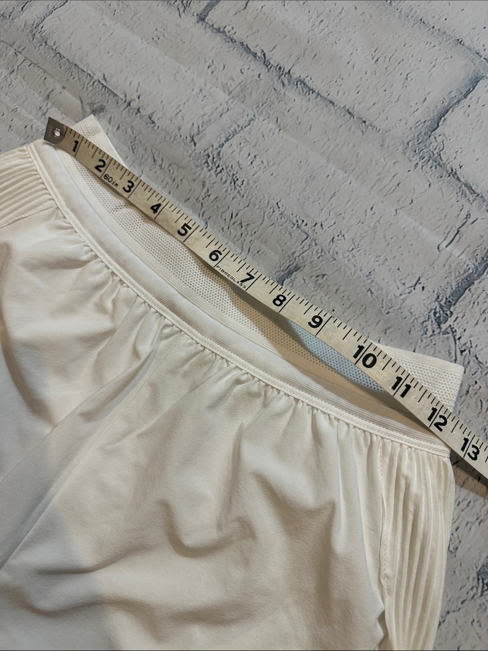 NWT Nike Women’s white pleated back Athletic Running Shorts with Black Swoosh - Picture 2 of 10